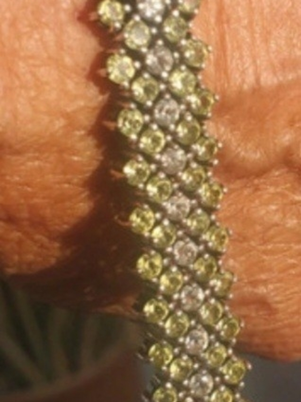 Platinum over Sterling Silver Peridot and White Topaz Tennis Bracelet